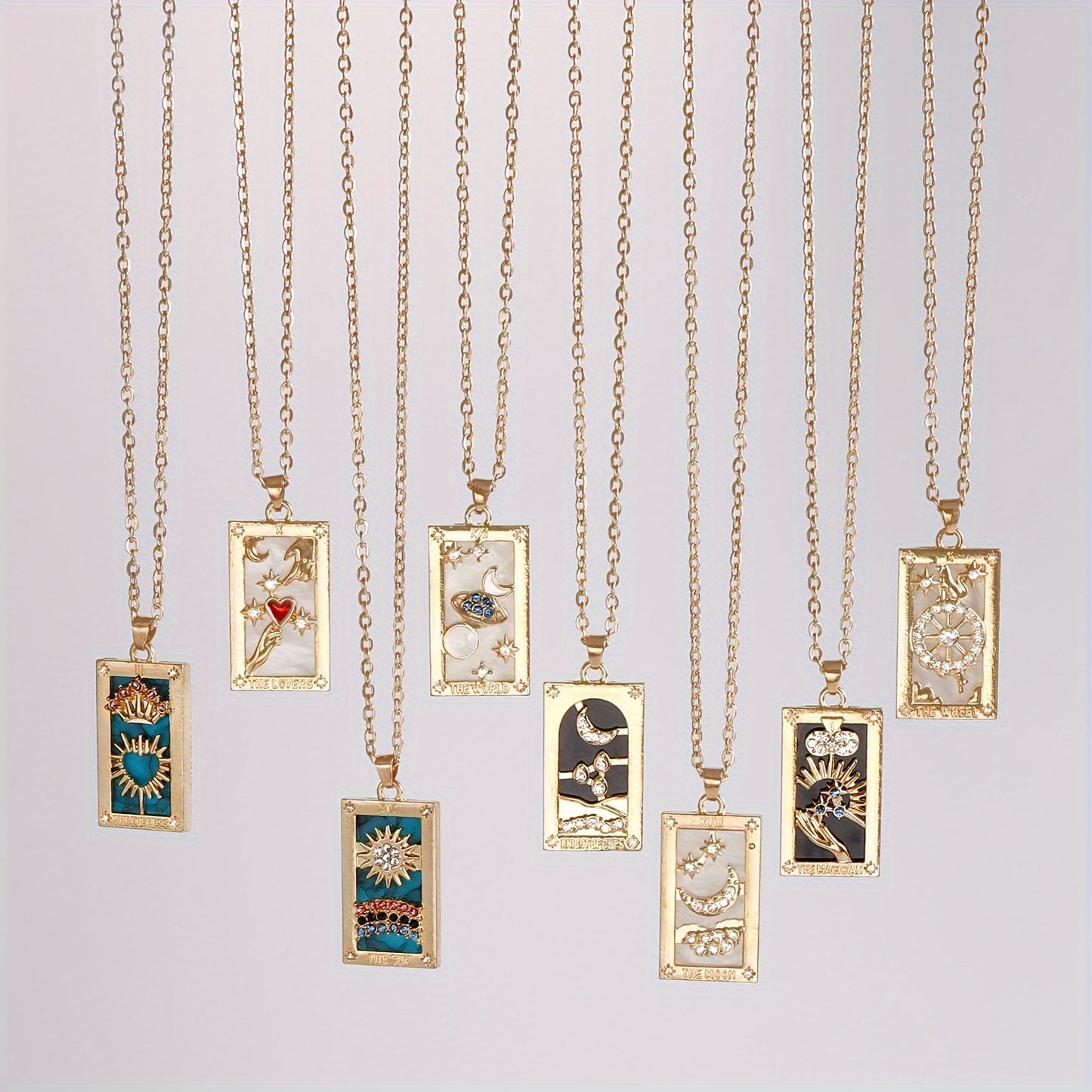 1pc Vintage Tarot Necklace with Sun Moon Heart World Card Pendants - Golden-Tone -Coated Astrology Symbols, Elegant Celestial Jewelry for Women, Casual Attire & Gift Idea, Zodiac Jewelry, Intricate Detailing, Bead Chain